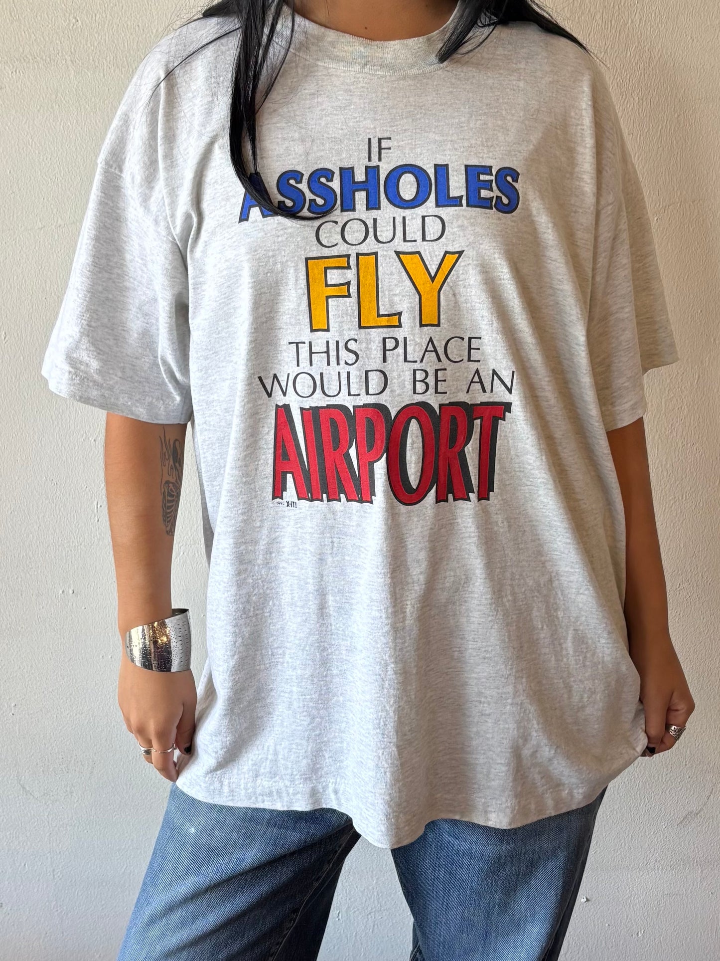 Vintage “If Assholes Could Fly This Place Would Be An Airport” Shirt