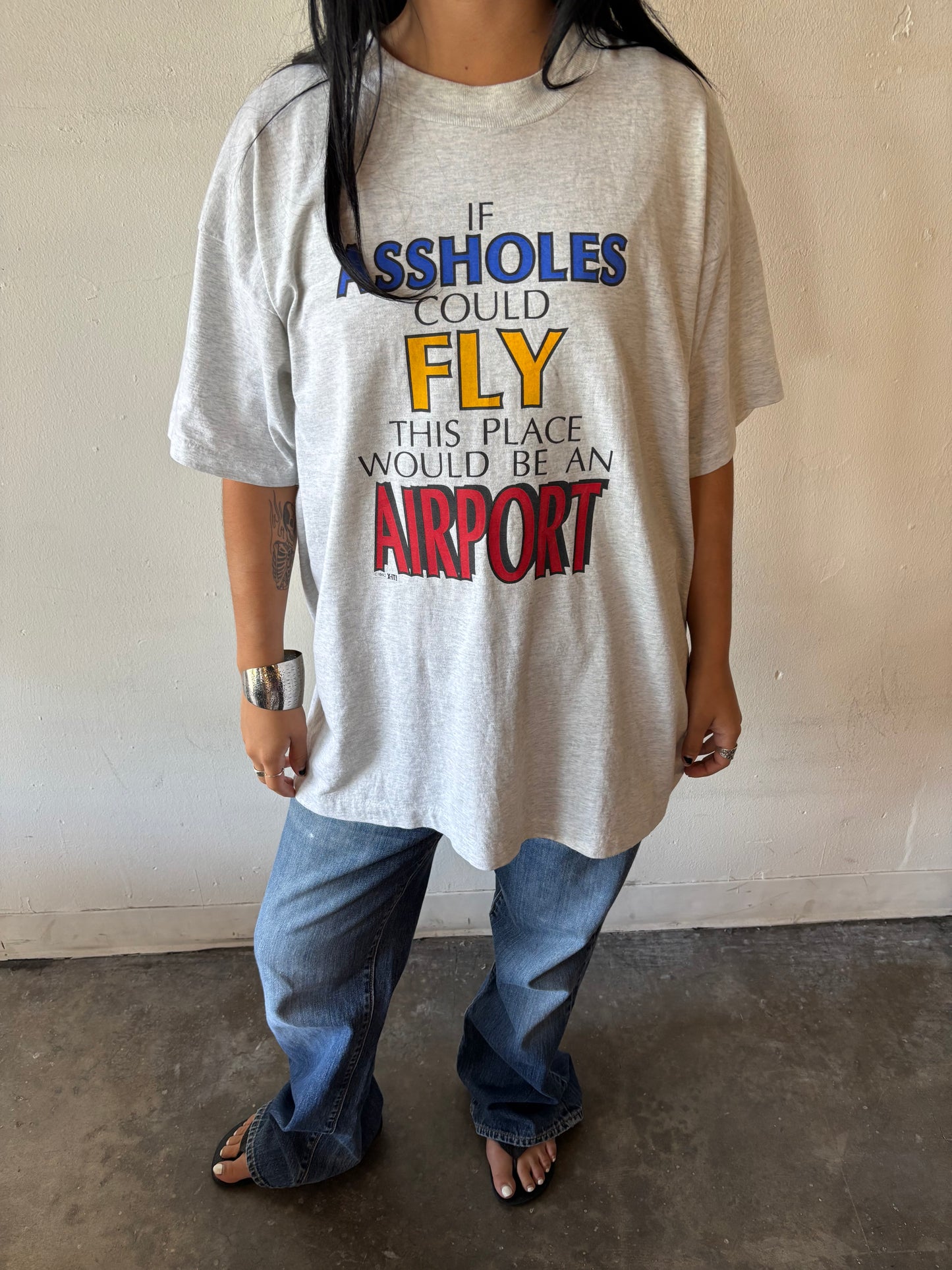 Vintage “If Assholes Could Fly This Place Would Be An Airport” Shirt